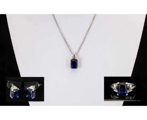 A Contemporary Silver And CZ Set Jewellery Suite Pendant necklace in pierced setting with large rectangular faceted cobalt bl