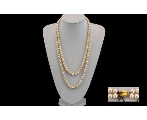 Ladies 1970's Nice Quality Double Strand Cultured Pearl Necklace of Graduated Form with a 9ct Gold Clasp. Marked 9ct. Good Lu