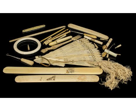 A Quantity Of Ivory And Bone Oddments And Collectibles To include a carved Napoleonic prisoner of war fork, perforated sugar 