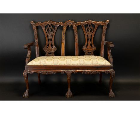 A Reproduction Miniature Child's Settle Apprentice Piece Small two seater sofa in the Georgian revival style raised on claw a