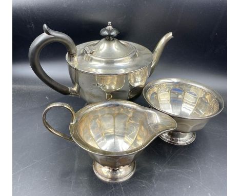 A silver tea service with teapot, sugar bowl and milk jug. Hallmarked for Sheffield 1930 by Viners Ltd (Approximate Total Wei