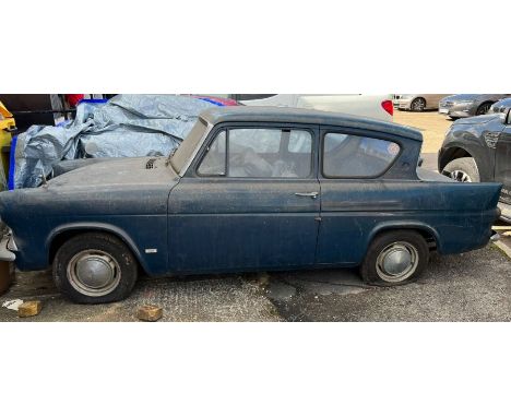 A Ford Anglia classic car 1964 saloon with the rare small grill front, 997cc, petrol, in blue. Milliage 81361 Registration BL