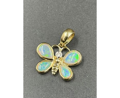 An 18ct yellow gold and opal Butterfly pendant