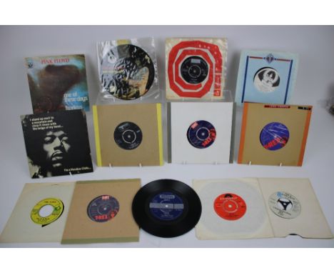 A group of twelve mixed singles, comprising Marc Bolan, T Rex, Jimi Hendrix, Pink Floyd. Condition Good (12)