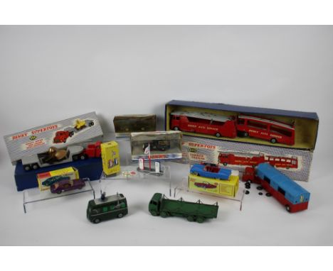 Nine assorted Dinky toys comprising Car carrier with trailer (983) , Mighty Antar Low Loader with Propeller (986), Foden flat
