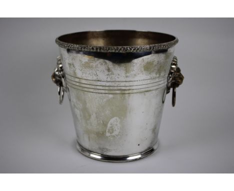 A good quality Early 20th Century Ice Bucket, vine leaf boarder to rim with loins heads masks with ring handles to either sid