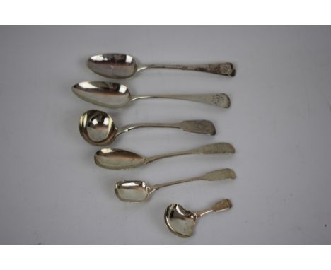 A Collection of Silver Spoons and a Sauce Ladle , comprising : serving spoon marked London 1800, another serving spoon marked