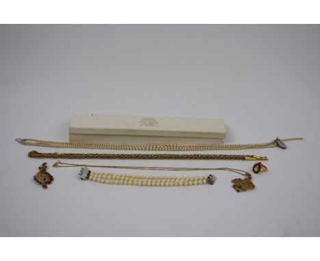 A Collection of Jewellery, comprising two emerald pendants, a fancy link chain, a cultured pearl bracelet, cultured pearl and