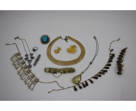 A Collection of Jewellery , comprising a Sapphire and colourless stone neckless, ring and five link panel, set with graduated