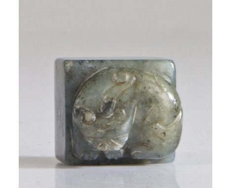 Chinese dark green jade tiger, Qing Dynasty, Tung Chih, (1856 - 1875) carved as a curled tiger on a plinth base, 2.4cm wide, 