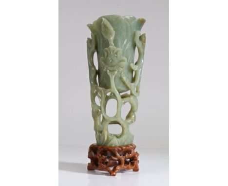 A large Chinese pierced jade Magnolia cup, late Ming Dynasty, 17th Century, of tall slender form, carved and pierced in the f