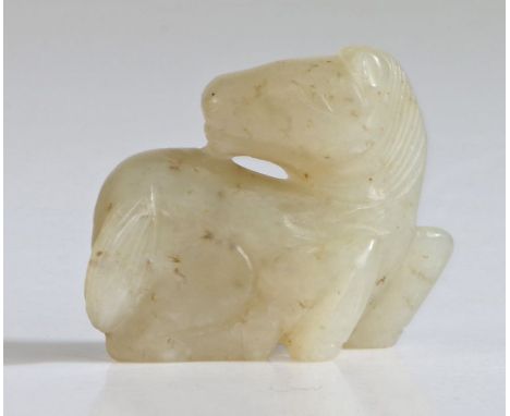 Chinese jade horse, Qing Dynasty, Kuang Hsu, (1875 - 1908) carved as a crouching horse, 3.7cm long, 3.2cm highUK Private coll