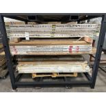 APPROX. 4200 LINEAR FEET OF QUARTER ROUND MOLDING AND 21 BOXES OF FLOORING