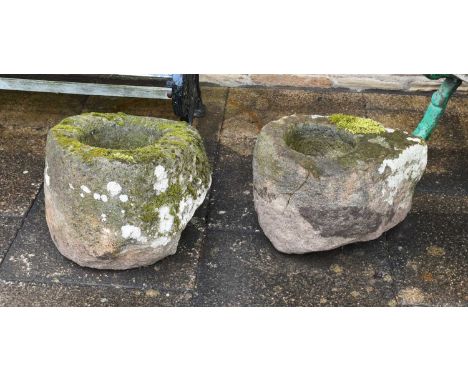 A 19th Century Carved Stone Garden Trough, of irregular circular form50cm by 35cmAnother Example,46cm by 40cm