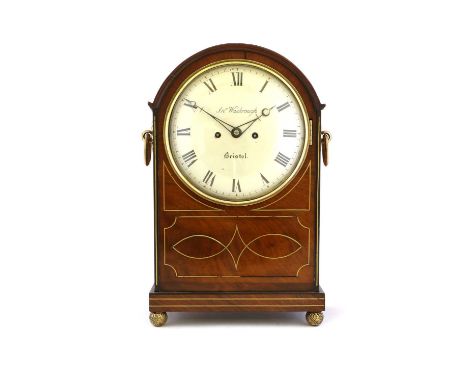 A Regency Mahogany Striking Table Clock, signed Jno Wasbrough, Bristol, circa 1820, arched pediment, side carrying handles an