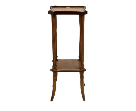 An Art Nouveau Walnut, Mahogany and Marquetry-Inlaid Two-Tier Occasional Table, early 20th century, the moulded square top in