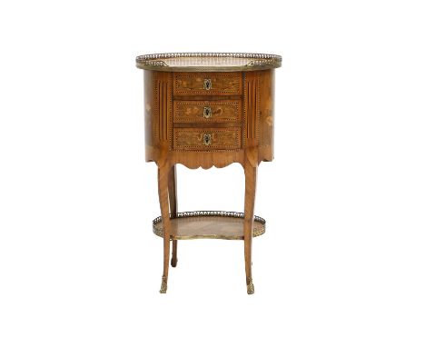 A Late 19th Century French rosewood, Marquetry-Inlaid Three Drawer Chest, in Louis XV style, the oval top with a pierced bras