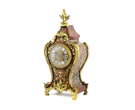 A French "Boulle" Striking Mantel Clock, circa 1890, tortoiseshell veneered case with floral and scroll brass inlay, cast dia
