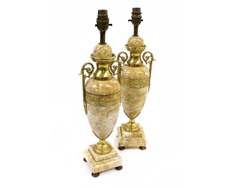 A Pair of French Gilt Metal Mounted Marble Lamp Bases, in Louis XVI style, of baluster form with twin acanthus leaf-sheathed 