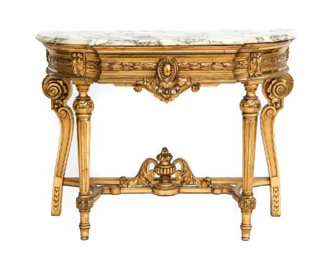 A 20th Century Carved Giltwood and Gesso Marble Top Console Table, in Louis XV style, the white, grey and yellow Siena marble