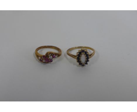 Two hallmarked 9ct gold rings, sizes L and R, approx 5.4 grams 