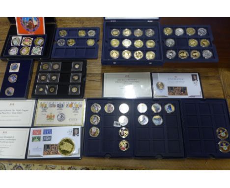 A collection of commemorative plated coins and a 2017 2oz silver coin and a £5 silver coin 