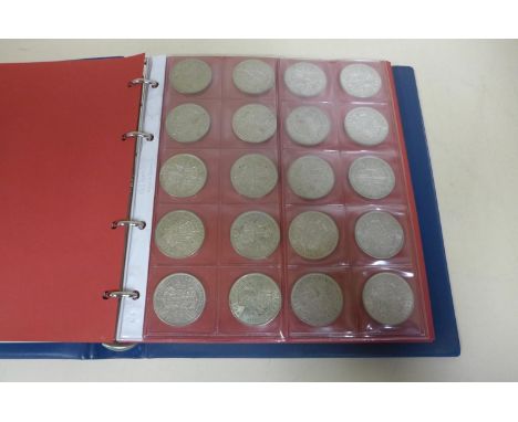 A British silver coin collection, many coins uncirculated - in an eight page folder 