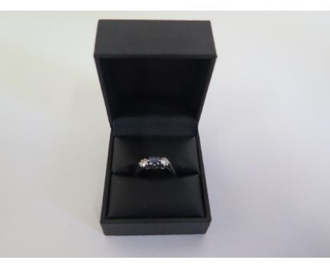 A pretty hallmarked 9ct white gold diamond and sapphire ring, size M/N, approx 2 grams, diamonds bright and lively, some smal