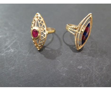 Two 18ct gold rings, marquise shape, one set ith an oval ruby, size N  - the second with red and blue enamel, size O- both wi