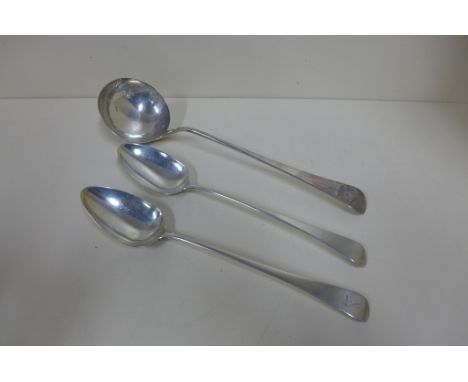 A pair of Georgian silver serving spoons, 19cm long, London 1803/04 - maker WE WF, with bird of prey crest, approx 6.7 troy o