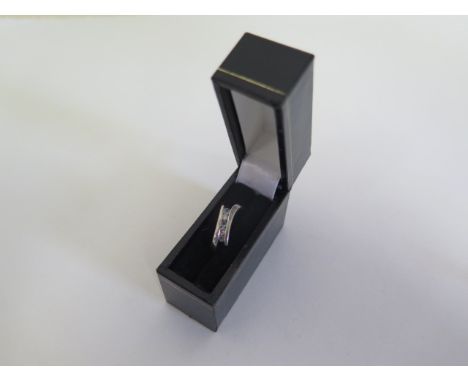 A hallmarked 9ct white gold five stone ring, size M, approx 1.7 grams, in good condition 