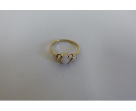 A hallmarked 9ct opal three stone ring, size M, good condition 