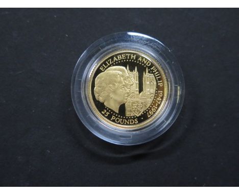 A 24ct gold 1997 Guernsey 25 pound coin, 7.81 grams 