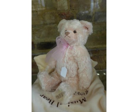 A Steiff Teddy Moh Rose Musical Bear - made to commemorate Princess Diana, it plays Candle in the Wind and is limited to 4000