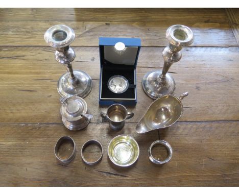 Assorted silverware including a mustard, a pair of weighted candlesticks and a £5 coin, weighable silver approx 9 troy oz 