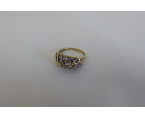 A hallmarked 9ct tanzanite set ring, size O, approx 3.3 grams, generally good 