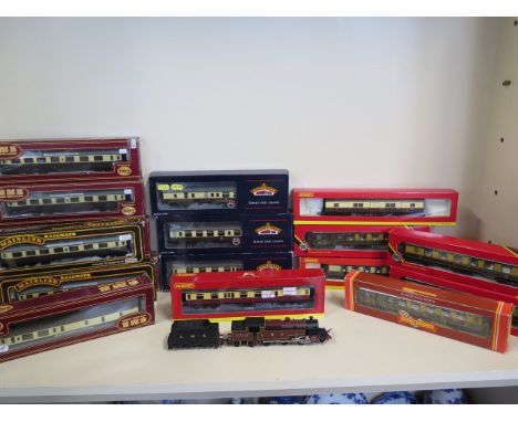 A Hornby LMS 2312 locomotive with tender together with six Hornby carriages, also five Airfix GMR carriages, Hornby luggage v