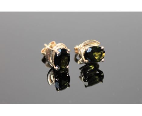 A pair of 9ct gold green tourmaline earrings, with post fittings