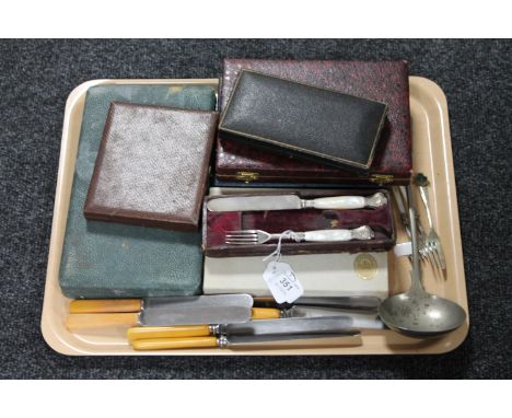 A tray of antique and later cutlery including fork and knife set, cased spoons etc 