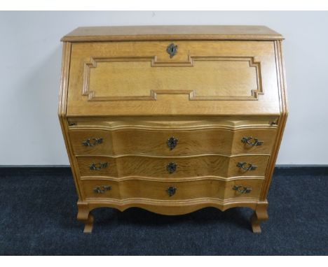 A continental light oak bureau 