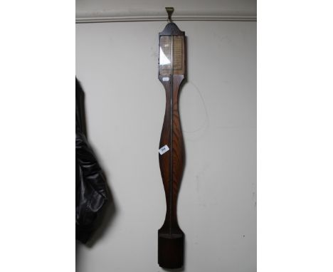 A continental oak stick barometer 