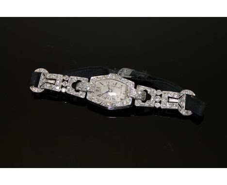 Superb quality Lady's platinum cocktail watch set with approximately 2.5ct diamonds CONDITION REPORT: The watch does not wind