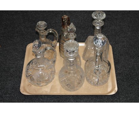 A tray of crystal decanters, crystal flask etc 