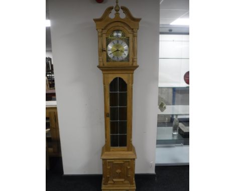 A continental light oak regulator clock 