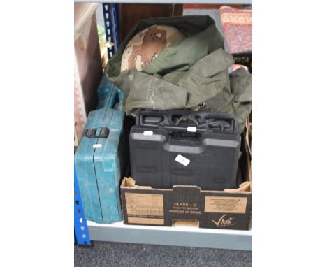A box of army ruck sack, clothing, helmet, tools by Makita etc 