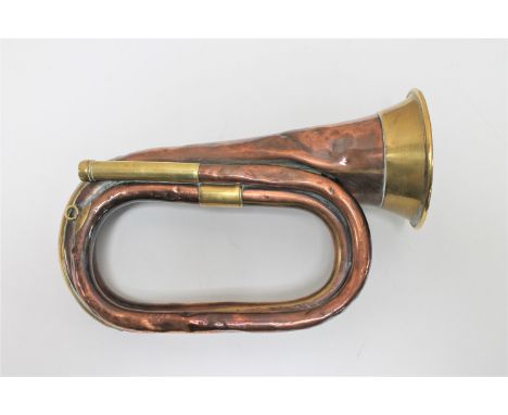A pre First World War British Army copper and brass bugle, dated 1911.