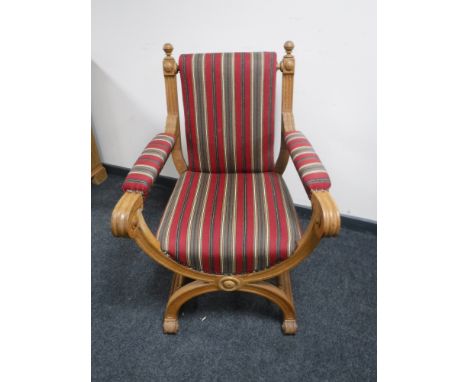 A light oak X-framed chair 