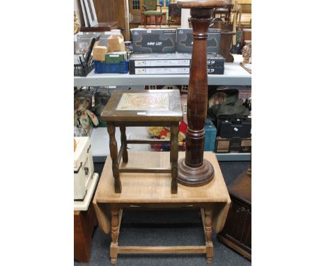 A light oak flap sided table together with a tiled top lamp table and torchere 