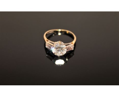 A 9ct gold CZ solitaire ring