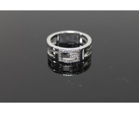 An 18ct gold diamond set ring by Gucci, 10.2g, (Cost £1,100 new)